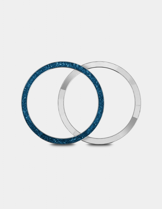 Reversible glittering ring